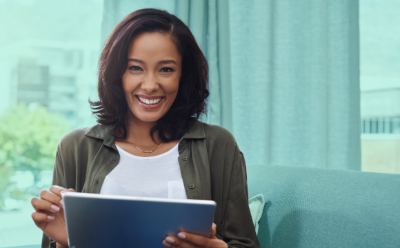Retail lease manager smiling with tablet