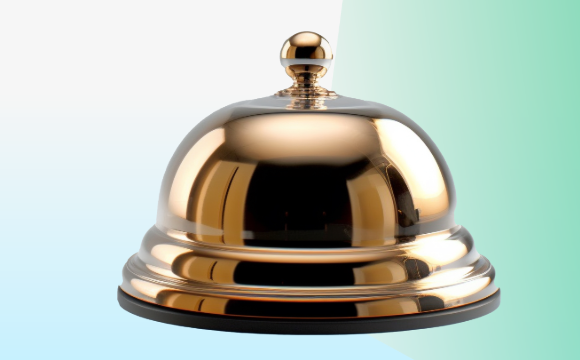 a gold concierge bell